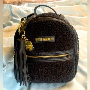 Steve Madden, mini backpack, black gold trim new with tags faux fur